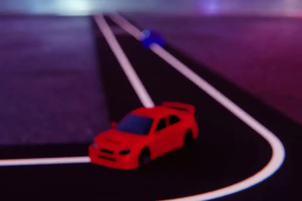 Un auto rojo en la pista de dos líneas blancas de la Carrera del Litio